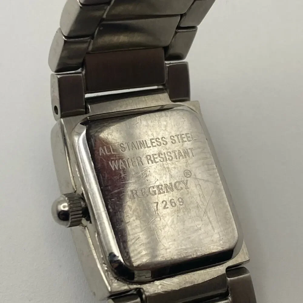Elegant Ladies Regency Silver Tone Watch Black Dial Crystal Bezel